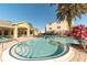 Community pool and lounging areas with chairs, perfect for relaxation and socializing in the building at 8124 Claire Ann Dr # 303, Orlando, FL 32825