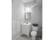 Bathroom with a white vanity, modern fixtures, and neutral gray walls at 860 N Orange Ave # 318, Orlando, FL 32801