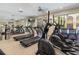 Well-equipped fitness center with treadmills, elliptical machines, and mirrors for a complete workout experience at 860 N Orange Ave # 318, Orlando, FL 32801