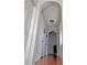 Hallway featuring sleek doors, archways, modern lighting and hardwood floors at 860 N Orange Ave # 318, Orlando, FL 32801