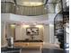 Community lounge with a pool table, spiral staircase and an overhead view of the game room at 860 N Orange Ave # 318, Orlando, FL 32801