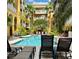 Beautiful community pool area, perfect for relaxation, surrounded by lush landscaping and seating at 860 N Orange Ave # 318, Orlando, FL 32801