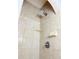 Shower with tile surround, decorative border and a rainfall shower head at 860 N Orange Ave # 318, Orlando, FL 32801