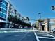 Street view of community near city center; walkable with shops, businesses, and modern buildings at 860 N Orange Ave # 318, Orlando, FL 32801