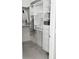 Organized walk-in closet with built-in shelving, drawers, and ample storage space at 860 N Orange Ave # 318, Orlando, FL 32801