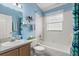 Clean bathroom featuring a combined shower and tub with classic white tile, offering a functional design at 912 Challenger Ave, Davenport, FL 33897