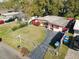Aerial view of a home showcasing the front yard, walkway, and driveway at 919 Timor Ave, Orlando, FL 32804