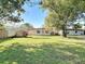Large backyard featuring a view of the house at 919 Timor Ave, Orlando, FL 32804
