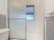 Cozy bathroom featuring a shower and tub with glass sliding doors at 919 Timor Ave, Orlando, FL 32804