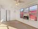 View of a bedroom featuring multiple windows, fan, and access to a closet at 919 Timor Ave, Orlando, FL 32804