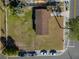 Aerial view of a home with a fenced yard and a fire pit area, perfect for outdoor entertainment at 925 Valleydale Ave, Deland, FL 32720
