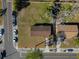 A bird's-eye view highlights a home with a large yard, enhanced by mature trees for privacy and shade at 925 Valleydale Ave, Deland, FL 32720