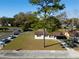 An aerial view of the home showcasing its well-maintained lawn and proximity to the street at 925 Valleydale Ave, Deland, FL 32720