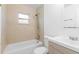 Bathroom featuring tiled shower over tub and modern vanity at 925 Valleydale Ave, Deland, FL 32720