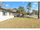 Exterior view of the home with a well-maintained front lawn at 925 Valleydale Ave, Deland, FL 32720