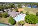 Community swimming pool with lounge chairs and lush greenery, perfect for relaxation and recreation in a serene environment at 10033 Hidden Dunes Ln, Orlando, FL 32832