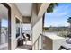 Charming balcony featuring a cozy seating area with nice views at 1004 Castle Pines Ct, Reunion, FL 34747