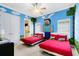 Fun bedroom with 'Minecraft' themed décor, two beds, and bright colorful accents at 1004 Castle Pines Ct, Reunion, FL 34747
