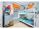 Vibrant bedroom designed with a 'Finding Nemo' theme, complete with bunk beds and decor at 1004 Castle Pines Ct, Reunion, FL 34747