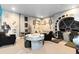 Unique game room showcases creative design elements and ample space for entertainment and relaxation at 1004 Castle Pines Ct, Reunion, FL 34747
