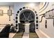 Themed game room with detailed decor and a unique entertainment area, perfect for fun and relaxation at 1004 Castle Pines Ct, Reunion, FL 34747