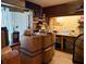 An office with built-in shelves, storage, and a large window for natural light at 10223 Marco Polo Dr, Orlando, FL 32821