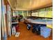Patio featuring indoor/outdoor living space with a sailboat and a tiled floor at 10223 Marco Polo Dr, Orlando, FL 32821