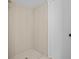 Modern bathroom featuring tiled walls and floors and a standing shower at 1035 W Minnehaha Ave, Clermont, FL 34711