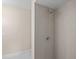 Modern bathroom with a tiled shower, perfect for relaxation at 1035 W Minnehaha Ave, Clermont, FL 34711