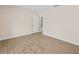 Bright bedroom with laminate flooring and ample closet space at 1035 W Minnehaha Ave, Clermont, FL 34711