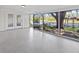 Enclosed porch with large windows offers scenic water views at 1035 W Minnehaha Ave, Clermont, FL 34711