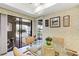 Bright breakfast nook with eat in glass table and sliding glass doors to outdoor patio area at 1055 Kensington Park Dr # 609, Altamonte Springs, FL 32714