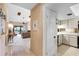 Hallway view into the living room and kitchen area at 1055 Kensington Park Dr # 609, Altamonte Springs, FL 32714