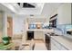 Well-lit kitchen with appliances, ample counter space and glass dining table, perfect for cooking and entertaining at 1055 Kensington Park Dr # 609, Altamonte Springs, FL 32714
