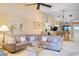 Bright living room featuring an open concept design and comfortable sectional sofa for relaxing and entertaining at 1055 Kensington Park Dr # 609, Altamonte Springs, FL 32714