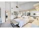 Bright bedroom with neutral decor, mirrors, and ample closet space, creating a peaceful retreat at 1055 Kensington Park Dr # 609, Altamonte Springs, FL 32714