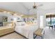 Spacious bedroom with ample storage, neutral decor, and balcony access for relaxing and enjoying the view at 1055 Kensington Park Dr # 609, Altamonte Springs, FL 32714
