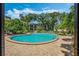 Enjoy the community pool with its inviting turquoise water and brick surround, perfect for relaxation and recreation at 1055 Kensington Park Dr # 609, Altamonte Springs, FL 32714