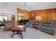 Open living room offers ample seating and a seamless transition to the kitchen and dining area at 1095 Grand Ave, Orange City, FL 32763