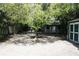 Backyard featuring a shed and mature trees at 115 W King St, Orlando, FL 32804