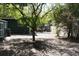 Backyard featuring a fire pit, patio furniture and shed at 115 W King St, Orlando, FL 32804