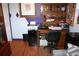 Home office with ample desk space, built-in shelving, and storage solutions for a productive work environment at 115 W King St, Orlando, FL 32804