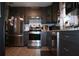 Efficient kitchen design with stainless steel appliances and ample counter space at 115 W King St, Orlando, FL 32804
