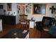Cozy living room featuring hardwood floors, comfortable seating, and a decorative rocking chair at 115 W King St, Orlando, FL 32804