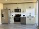 Modern kitchen with stainless steel appliances, ample cabinet space and a bright atmosphere at 155 S Court Ave # 1506, Orlando, FL 32801