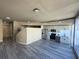 Spacious open-concept living room with modern flooring and great natural light at 155 S Court Ave # 1506, Orlando, FL 32801