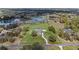 Expansive home on acreage featuring beautiful pond views from nearly every window at 15523 Trotting Horse Ln, Tavares, FL 32778