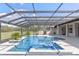 Beautiful pool with a hot tub and clear view of blue sky at 15523 Trotting Horse Ln, Tavares, FL 32778