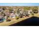 Backyard featuring a pool, patio, and views of the pond, creating a perfect spot for outdoor enjoyment and relaxation at 2112 White Eagle St, Clermont, FL 34714