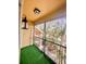 Screened balcony offers an inviting spot to relax and enjoy outdoor living at 2624 Robert Trent Jones Dr # 633, Orlando, FL 32835